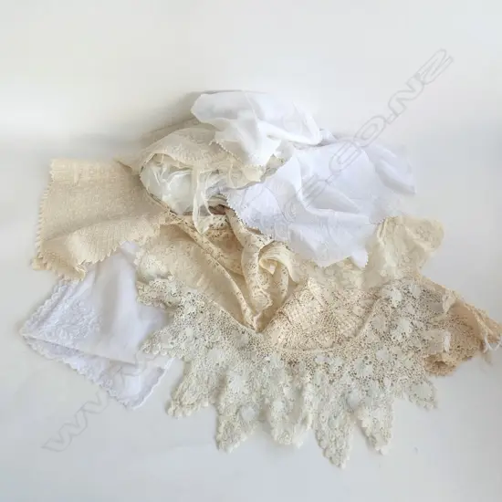 A collection of antique lace and net fashion pieces.